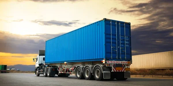 depositphotos_655756242-stock-photo-semi-trailer-truck-driving-highway